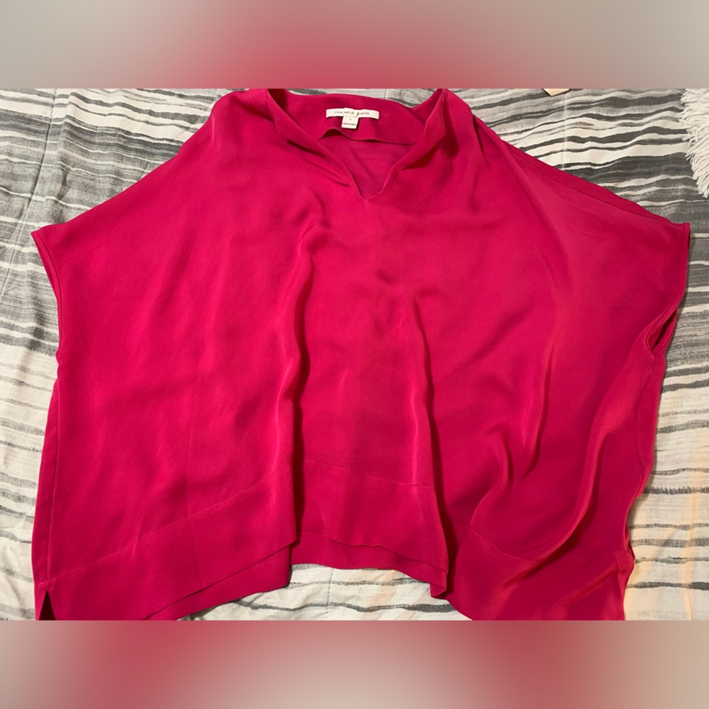 Diane von Furstenberg, 100% silk, size small. Fits like blue shirt pictured
